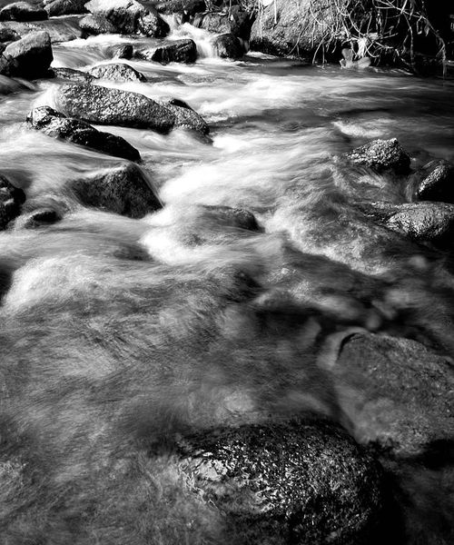 Frozen stream flow representing movement and continuity
